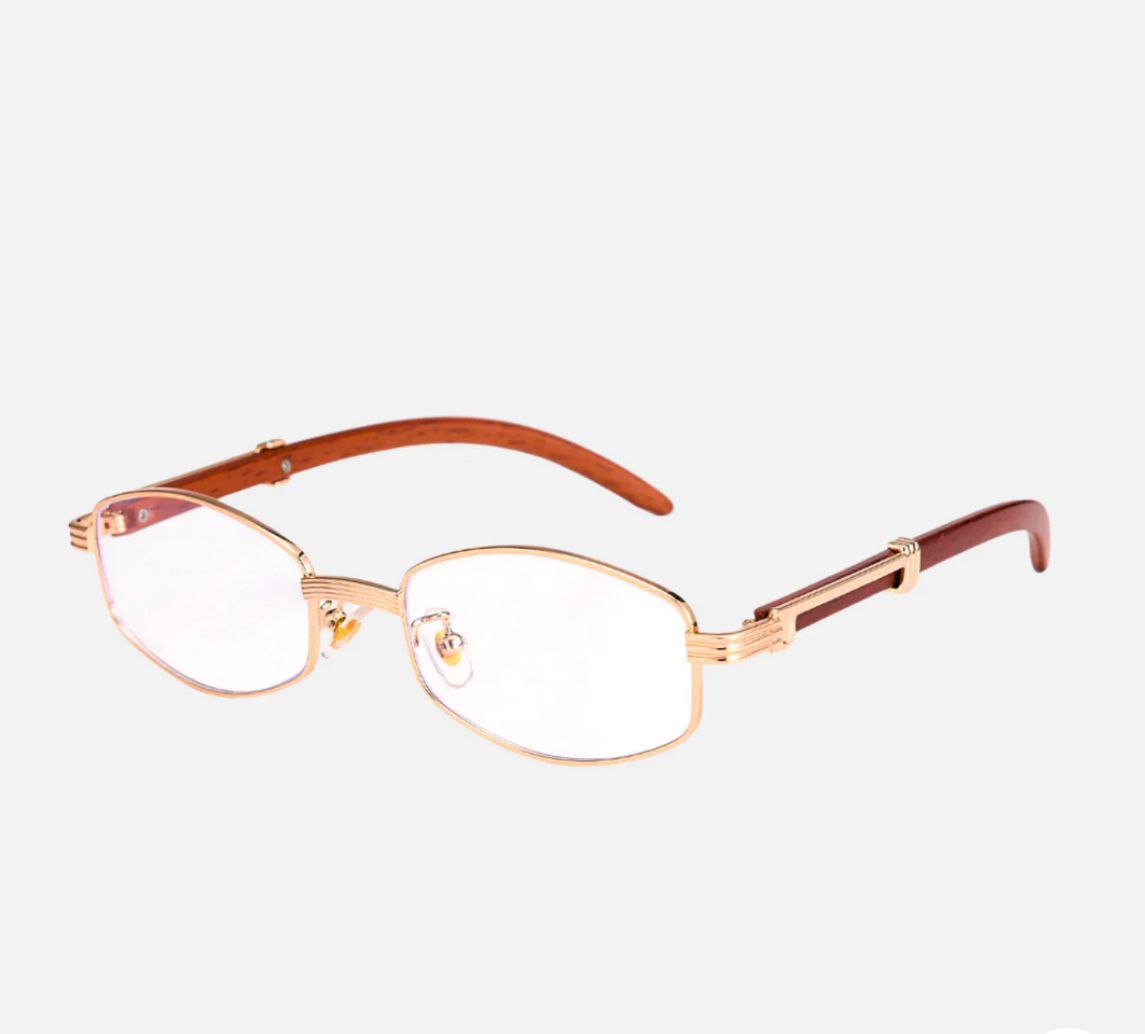 👓✨ أناقة كلاسيكية بلمسة عصرية مع نظارات Only Vintage Amsterdam Brnd الذهبية والخشبية! ✨👓